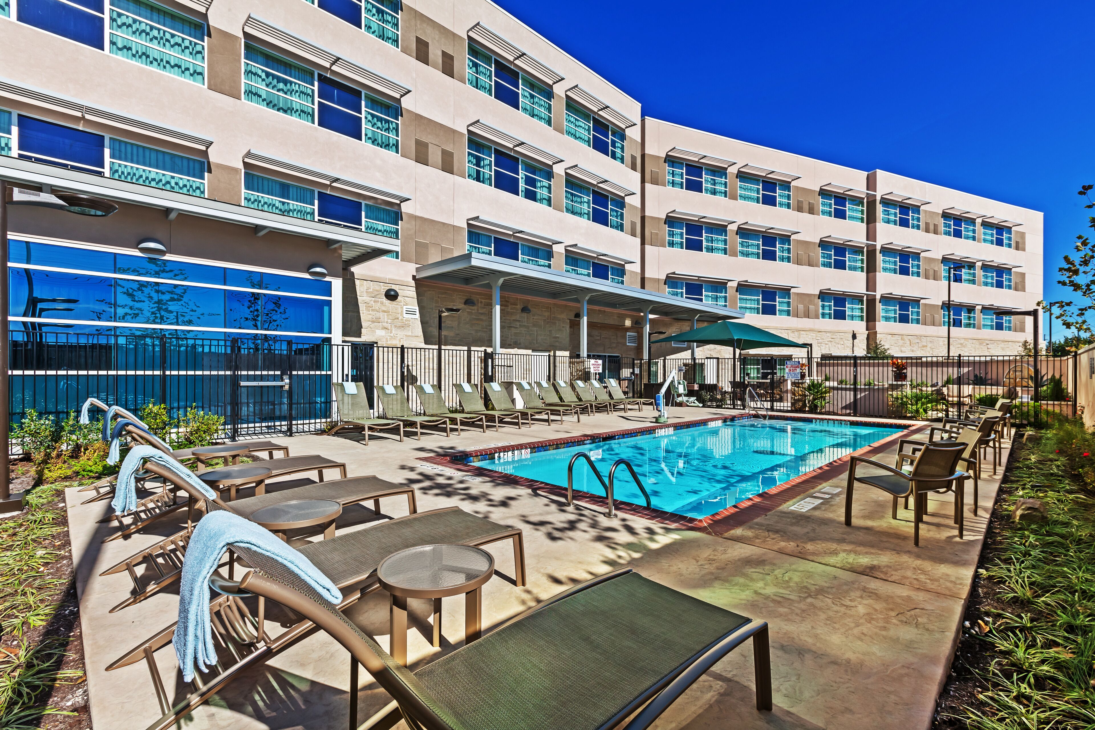 outdoor pool, pool loungers
