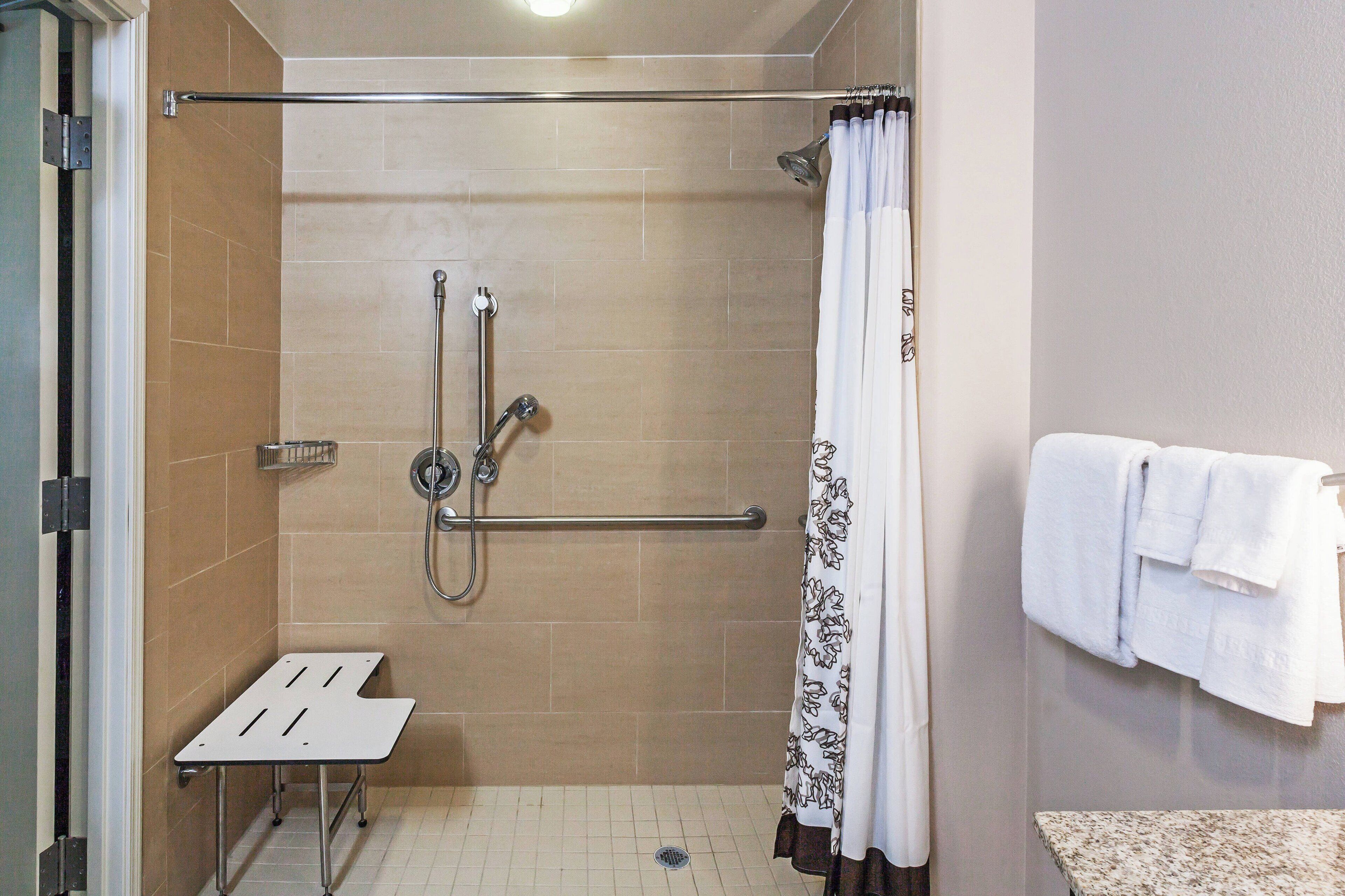combined shower/bathtub, free toiletries, hair dryer, towels