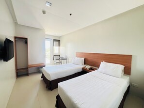 Chambre supĂ©rieure avec lits jumeaux | Bureau, systĂšme dâinsonorisation, accĂšs au Wi-Fi (inclus)
