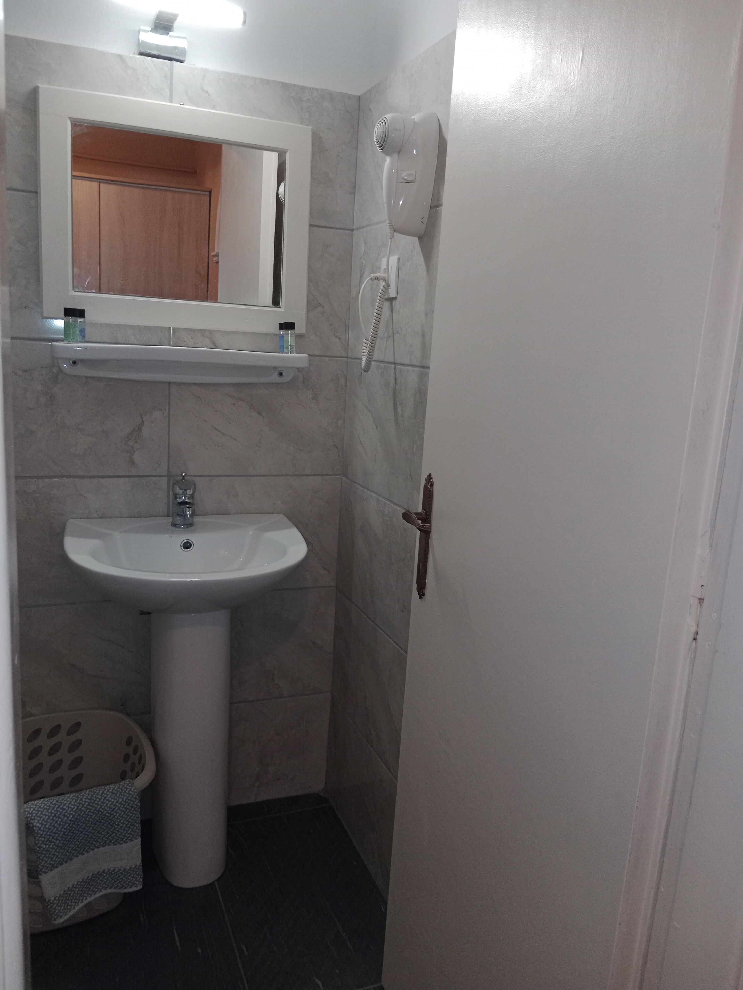 shower, free toiletries, hair dryer, slippers