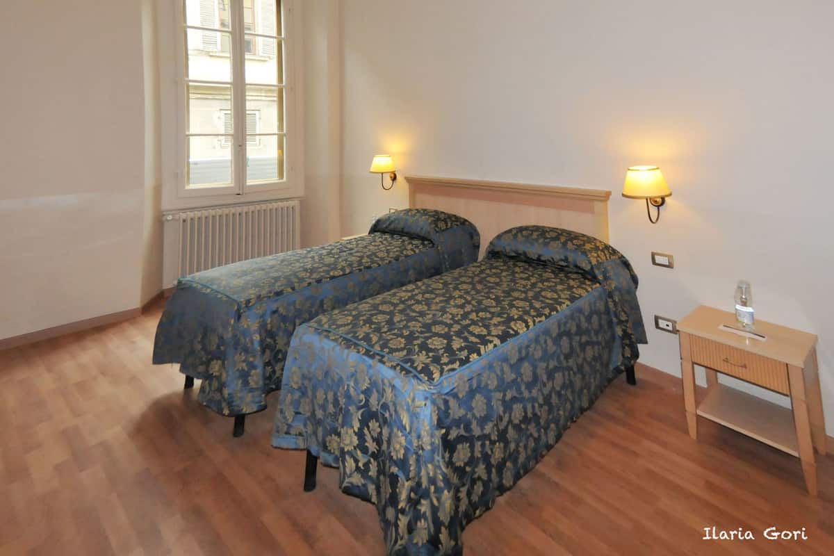 Twin Room, 2 Single Beds | In-room safe, free WiFi, bed sheets