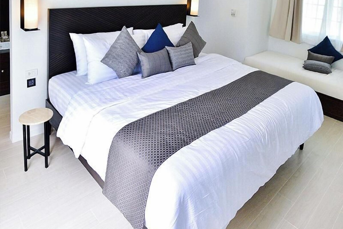 Luxe beddengoed, een kluis op de kamer, een bureau, gratis wifi