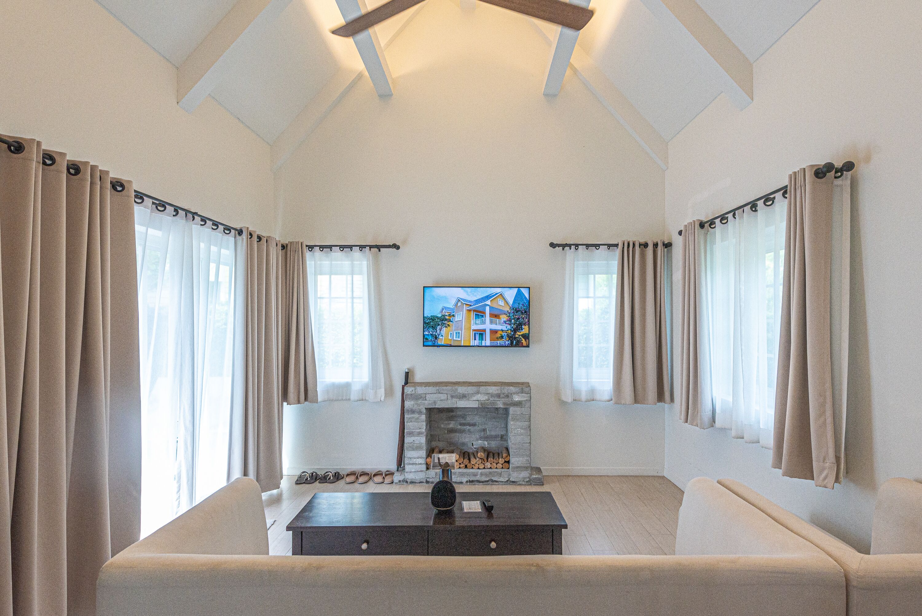 grand pool villa | living room | 42-inch led tv with cable channels, tv