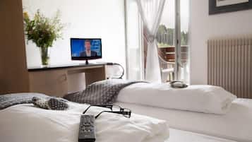 Habitación con 1 cama matrimonial o 2 individuales | Minibar, caja de seguridad en la habitación, escritorio y wifi gratis