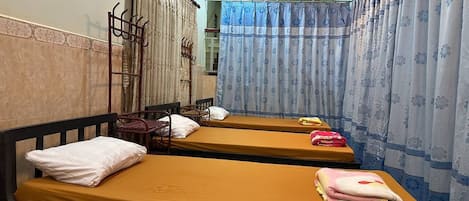 Economy Room, Mixed Dorm, Garden View | Premium bedding, desk, free WiFi, bed sheets