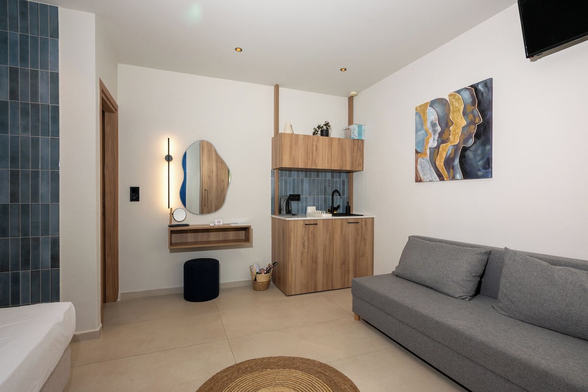 Family Apartment, 1 Bedroom, Garden View | Desk, iron/ironing board (on request), cribs (free), WiFi (free)