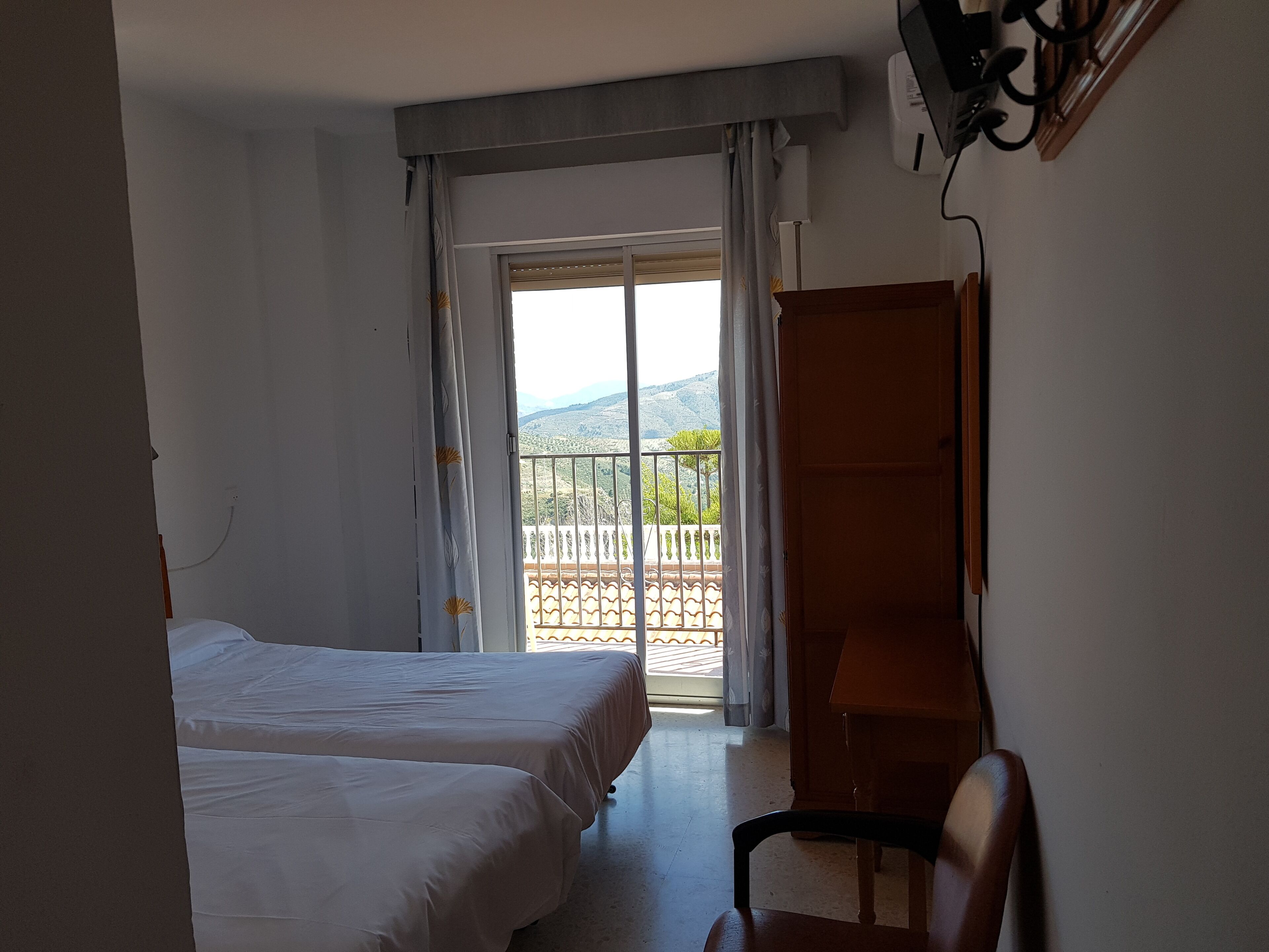 Economy Twin kamer, 2 eenpersoonsbedden | Verduisterende gordijnen, gratis wifi, beddengoed