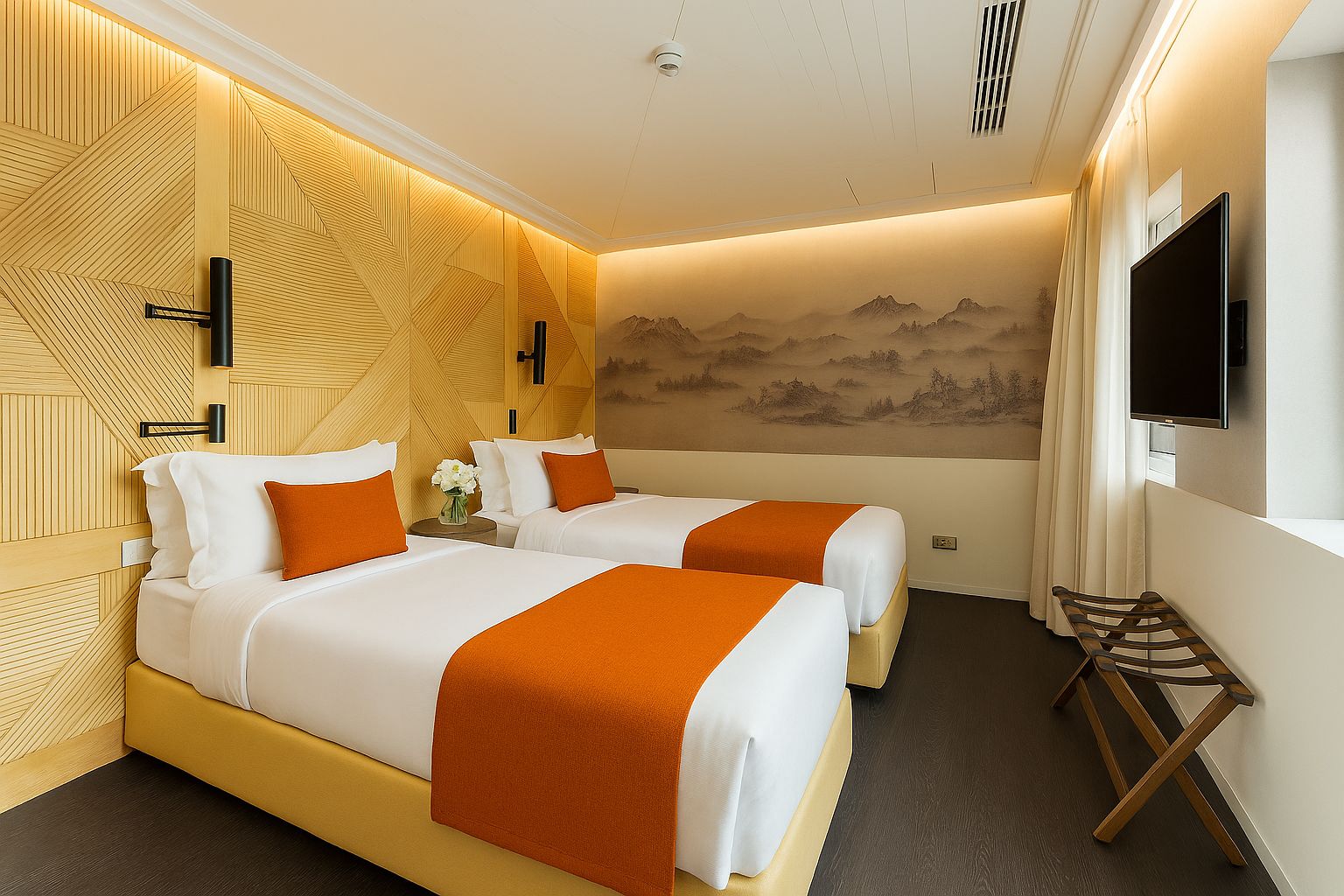 Habitación de hotel con dos camas, un televisor y un mural en la pared.