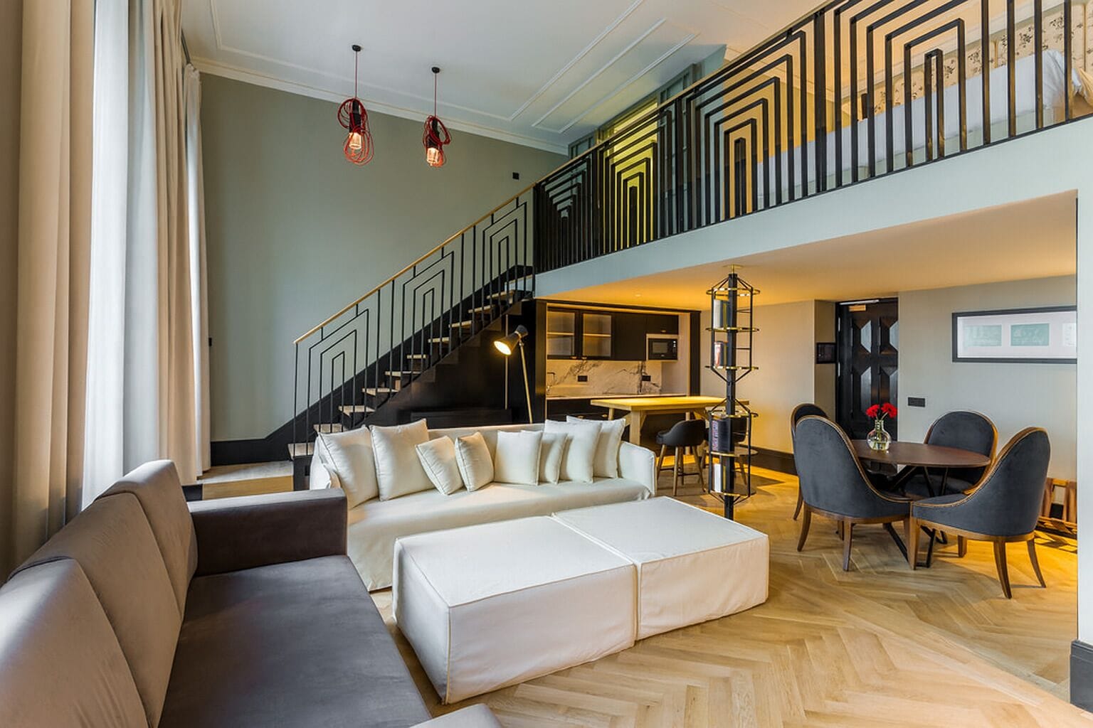 Loft Suite | Living area | Flat-screen TV, heated floors