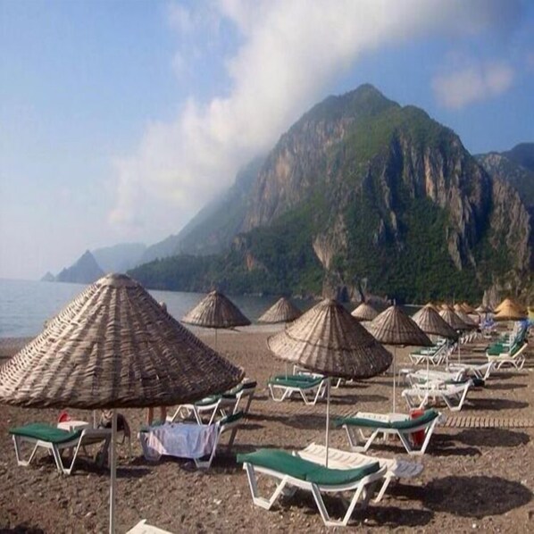 Private beach, sun loungers, beach umbrellas, beach towels