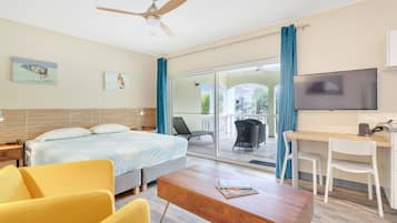 Deluxe Studio, Pool View, Poolside | Premium bedding, in-room safe, individually decorated, laptop workspace