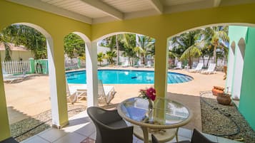 Deluxe Studio, Pool View, Poolside | Outdoor pool | Outdoor pool, sun loungers