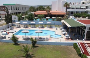 Outdoor pool, pool umbrellas, pool loungers