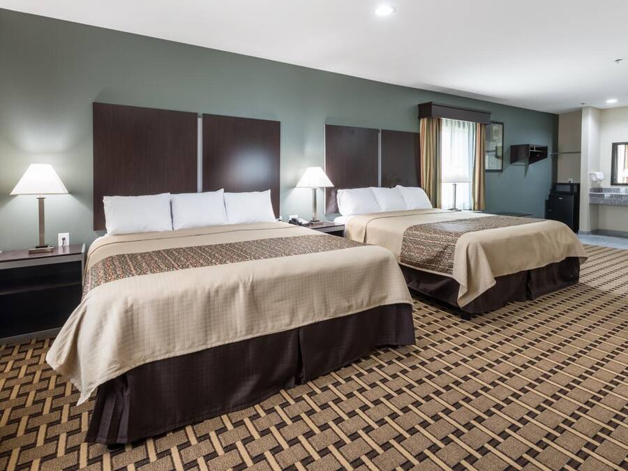 Premium bedding, memory-foam beds, desk, blackout curtains