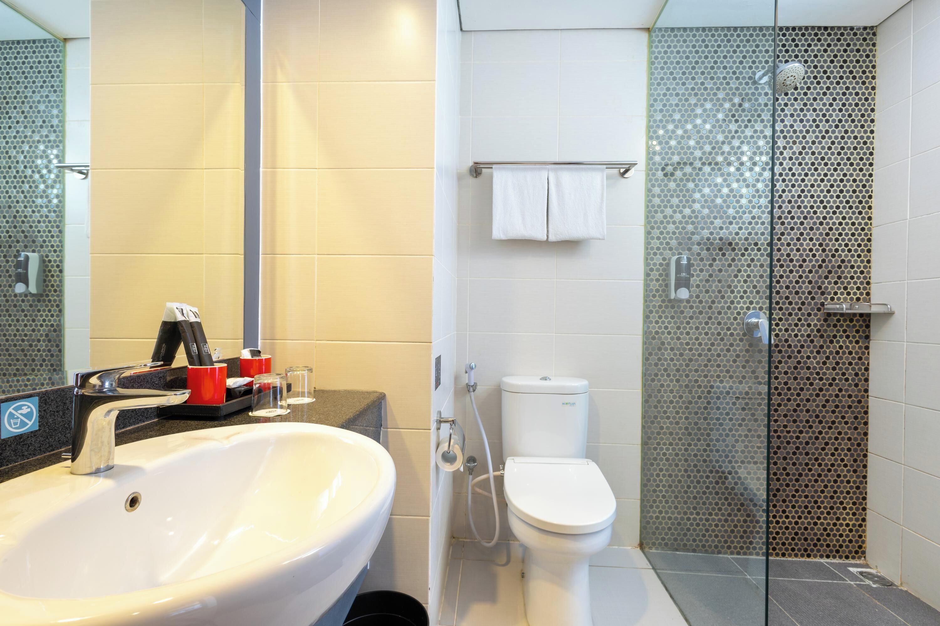 shower, free toiletries, hair dryer, towels