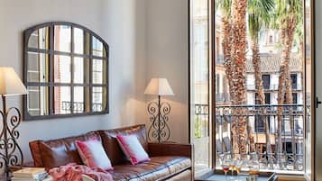 Apartment, 1 Bedroom, Balcony (Adults Only) | Living area | 32-inch flat-screen TV with satellite channels, TV