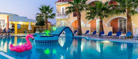 Seasonal outdoor pool, pool umbrellas, pool loungers