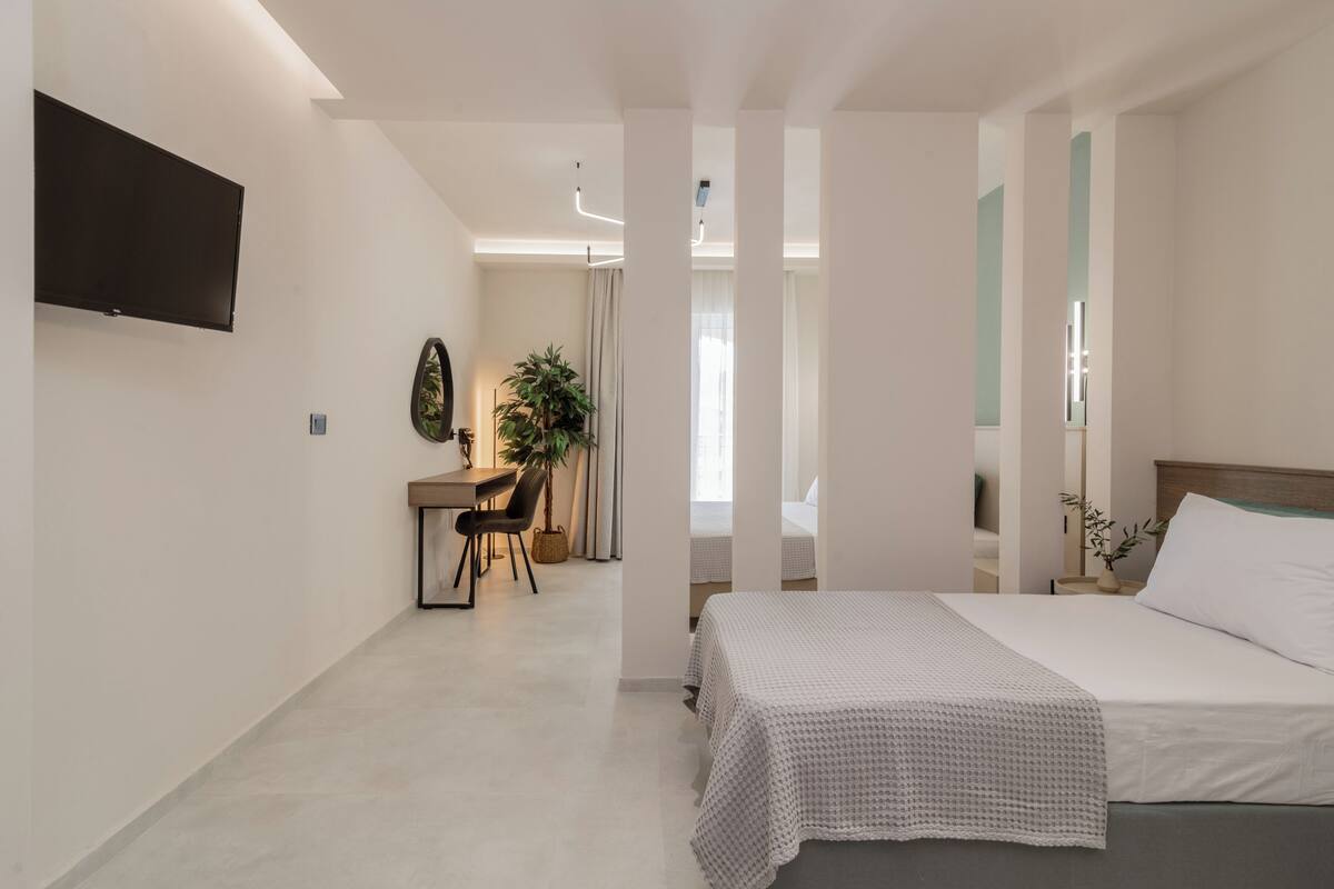 deluxe room, pool view | 1 bedroom, in-room safe, desk, free wifi