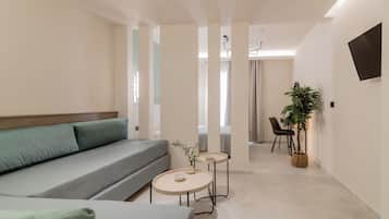 Habitación Deluxe, vista a la alberca | Caja de seguridad en la habitación, escritorio y wifi gratis