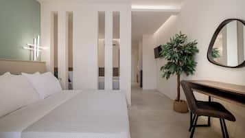 Habitación Deluxe, vista a la alberca | Caja de seguridad en la habitación, escritorio y wifi gratis