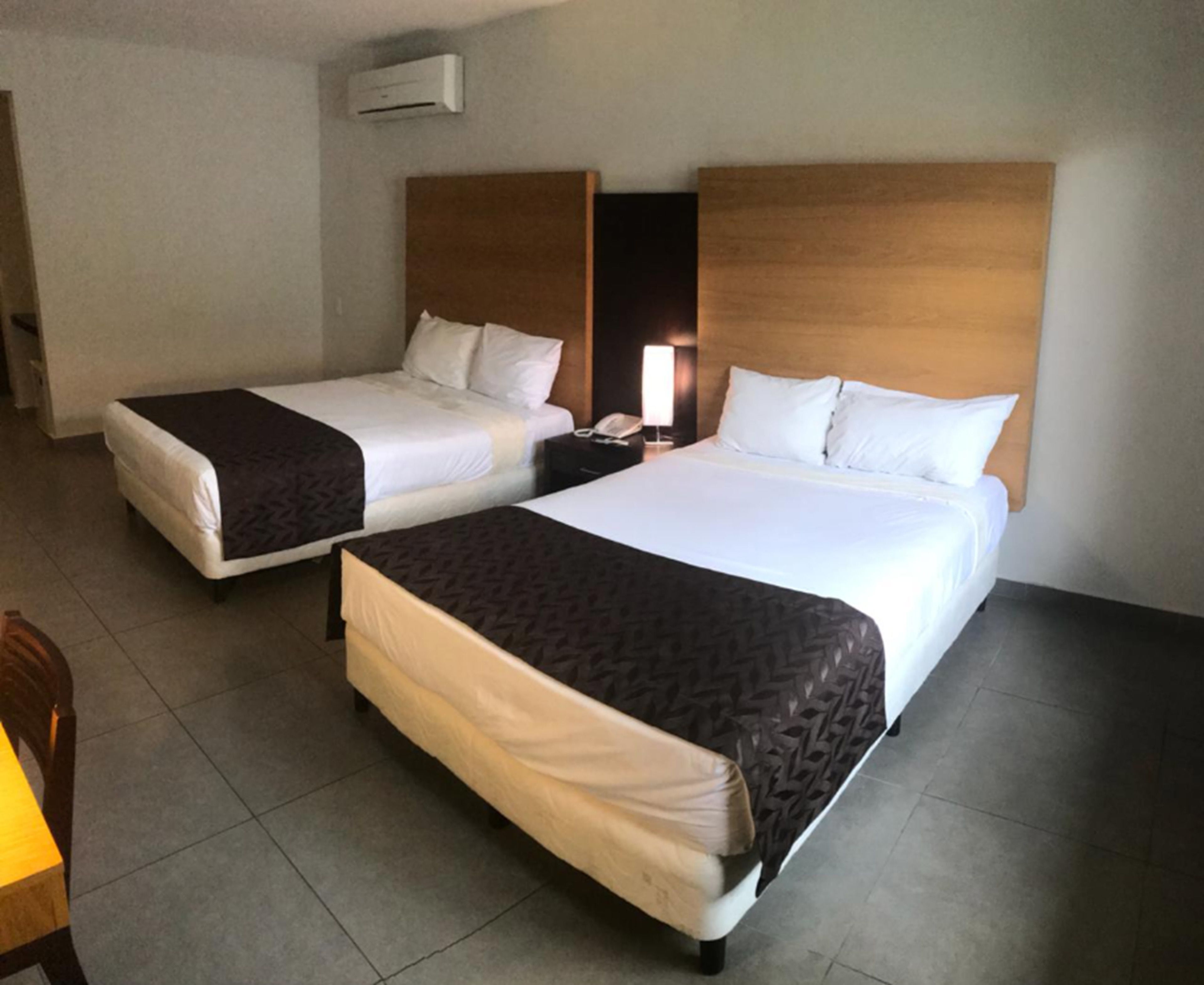 deluxe twin room, 2 double beds, non smoking | in-room safe, desk, iron/ironing board, free wifi