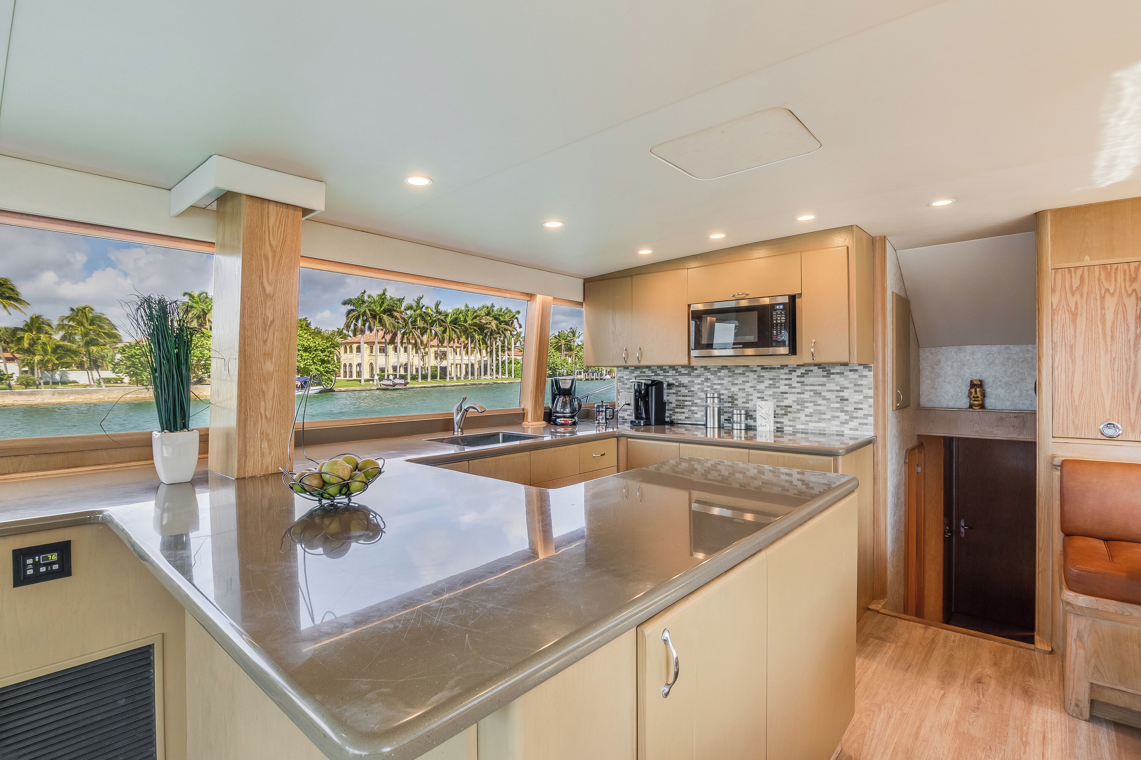 Luxury Suite | Private kitchen | Coffee/tea maker, highchair