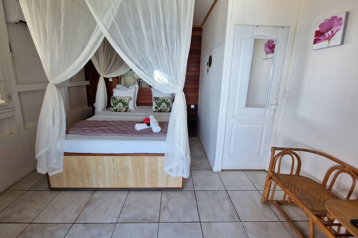 Room (Chambre Vue Mer) | 1 bedroom, soundproofing, iron/ironing board (on request), cribs (free)