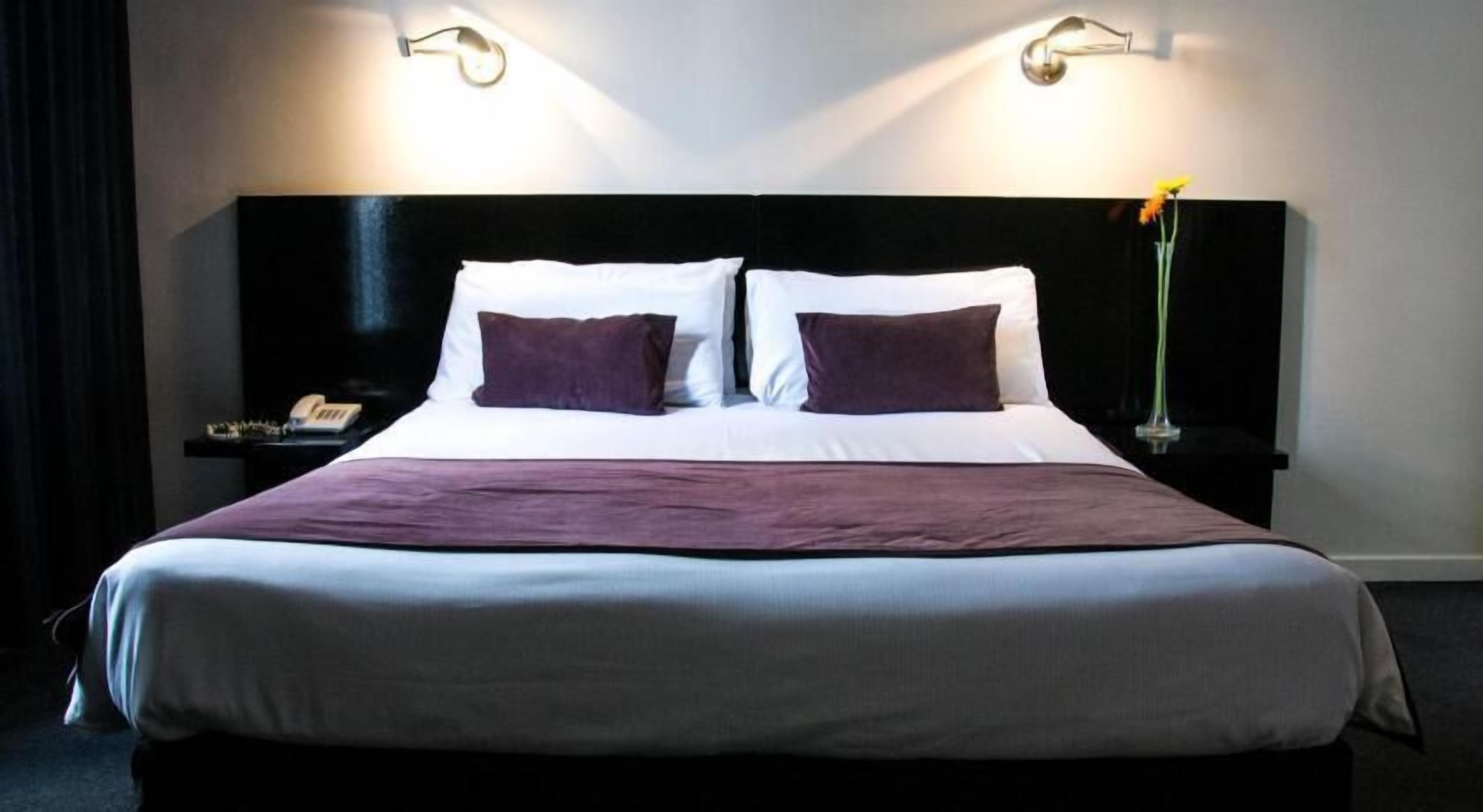 Premium bedding, down comforters, pillowtop beds, minibar