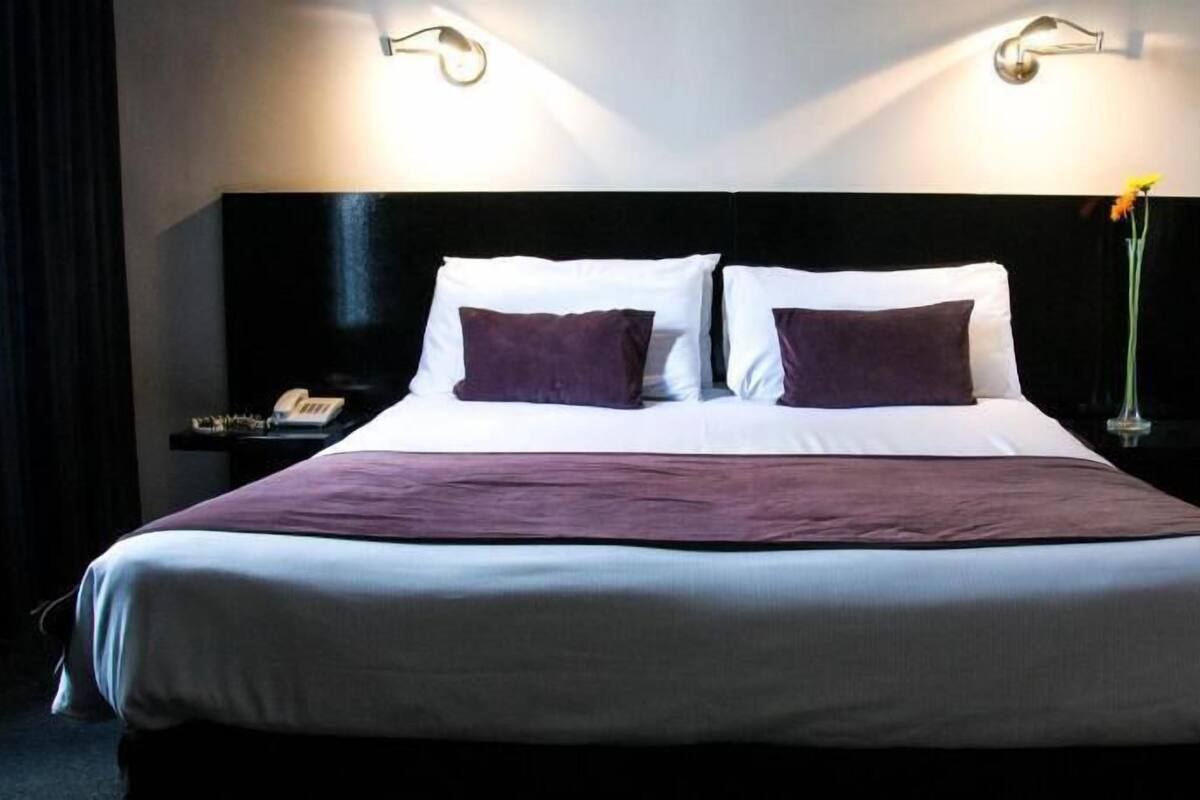 Premium bedding, down comforters, pillowtop beds, minibar