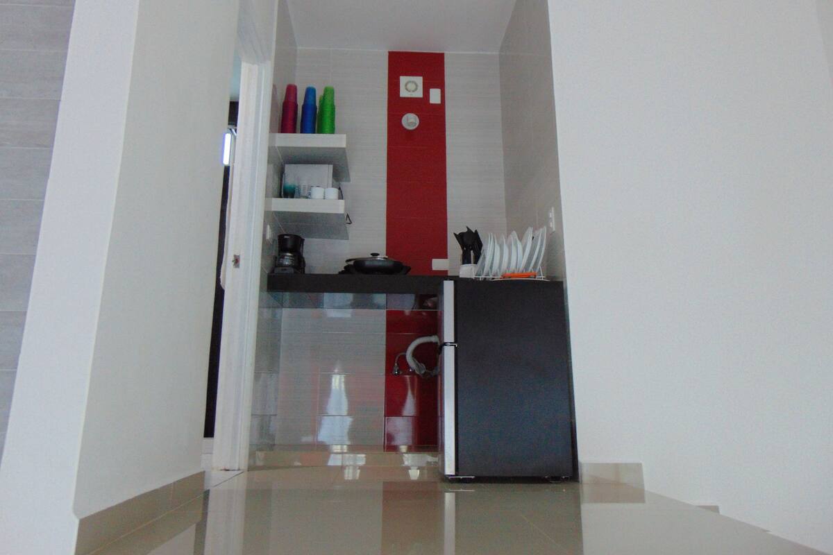 Apartamento júnior, 1 cama de solteiro grande | 1 quarto, roupas de cama premium, ferros/tábuas de passar roupa