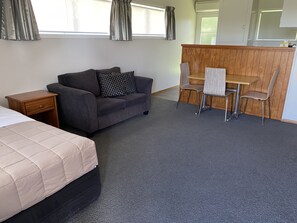 2 Bedroom Family Unit  | Living area | Flat-screen TV - Colonial Motel (Papakura)