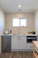 Studio Unit | Private kitchen | Fridge, microwave, coffee/tea maker, electric kettle