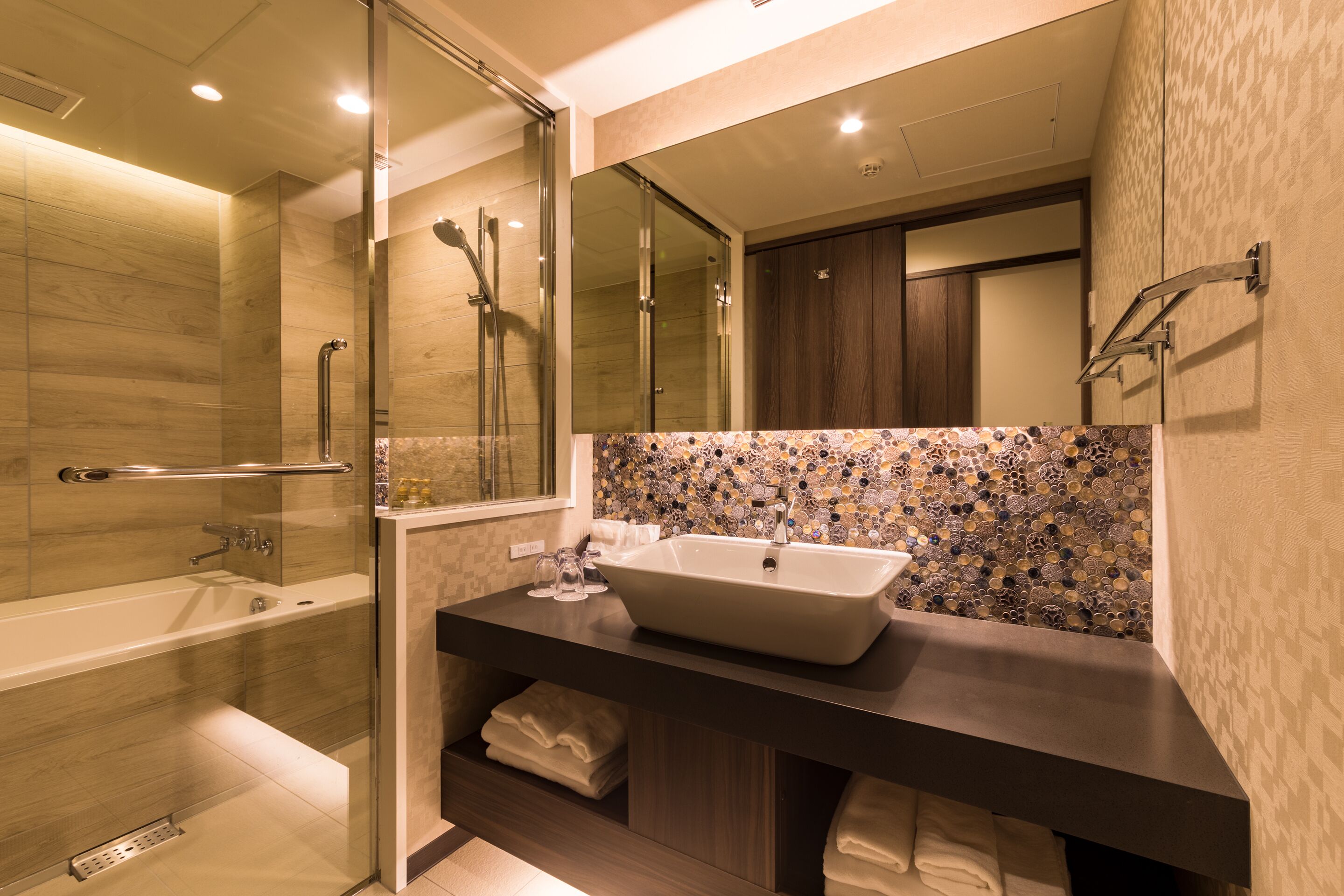 separate bathtub and shower, free toiletries, hair dryer, slippers