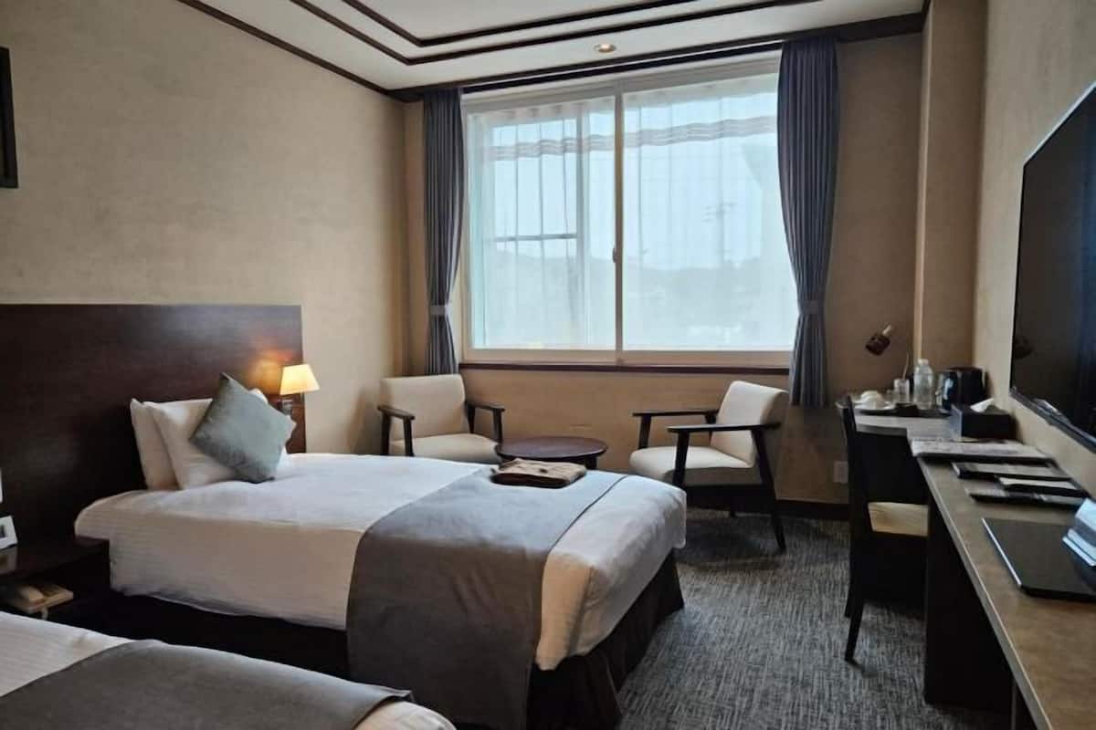 Desk, free WiFi, bed sheets