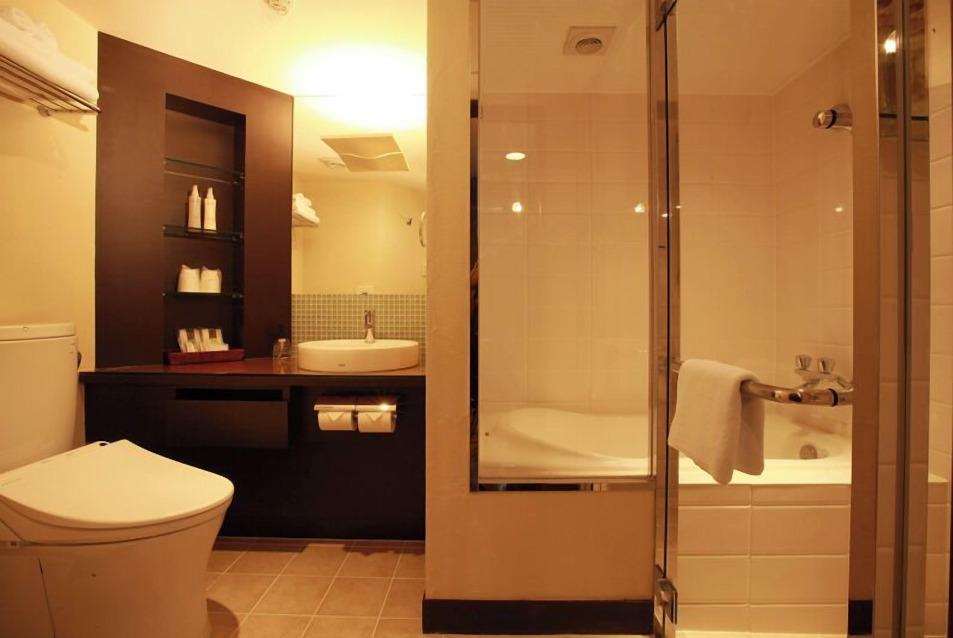 separate bathtub and shower, free toiletries, hair dryer, slippers