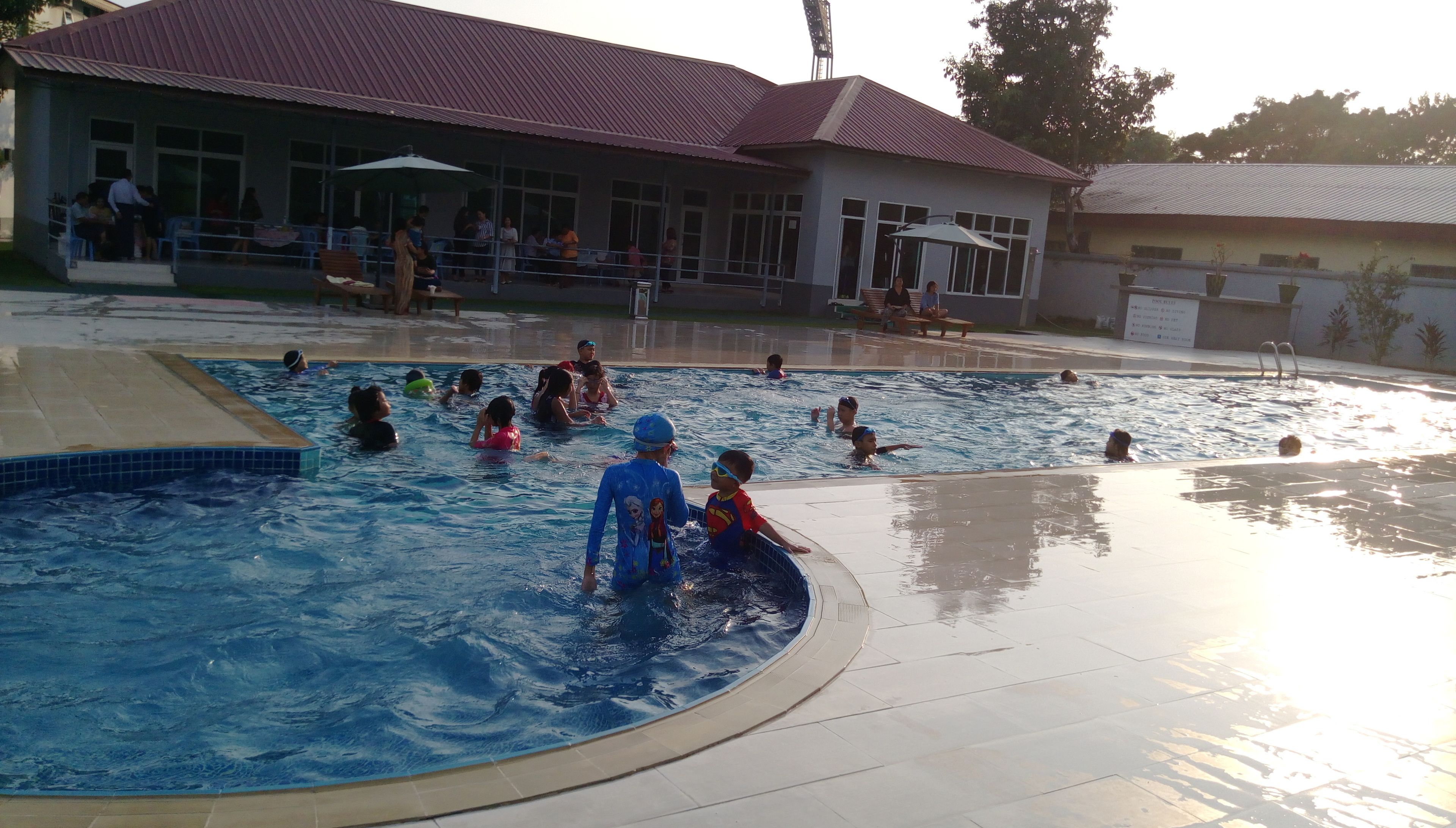 Outdoor pool, open 7 AM to 8:30 AM, pool umbrellas, pool loungers