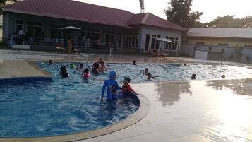 Outdoor pool, open 7 AM to 8:30 AM, pool umbrellas, pool loungers
