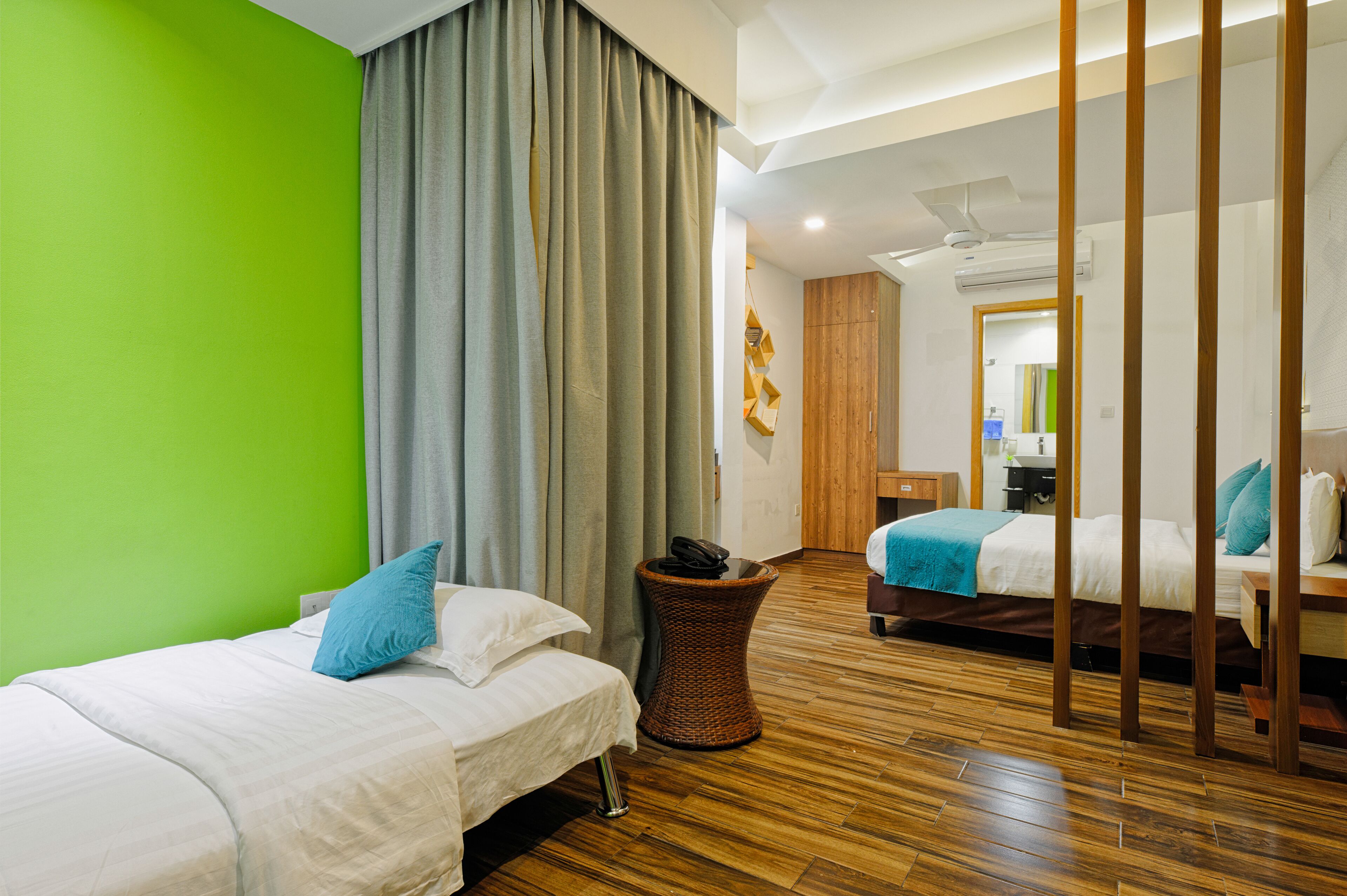 deluxe suite with complimentary transfer | in-room safe, iron/ironing board, wifi, bed sheets