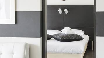 Deluxe tweepersoonskamer | Een kluis op de kamer, babybedden, extra bedden, gratis wifi
