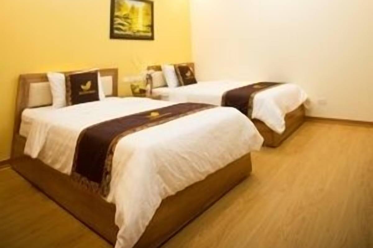 Chambre Deluxe avec lits jumeaux | Minibar, bureau, Wi-Fi gratuit