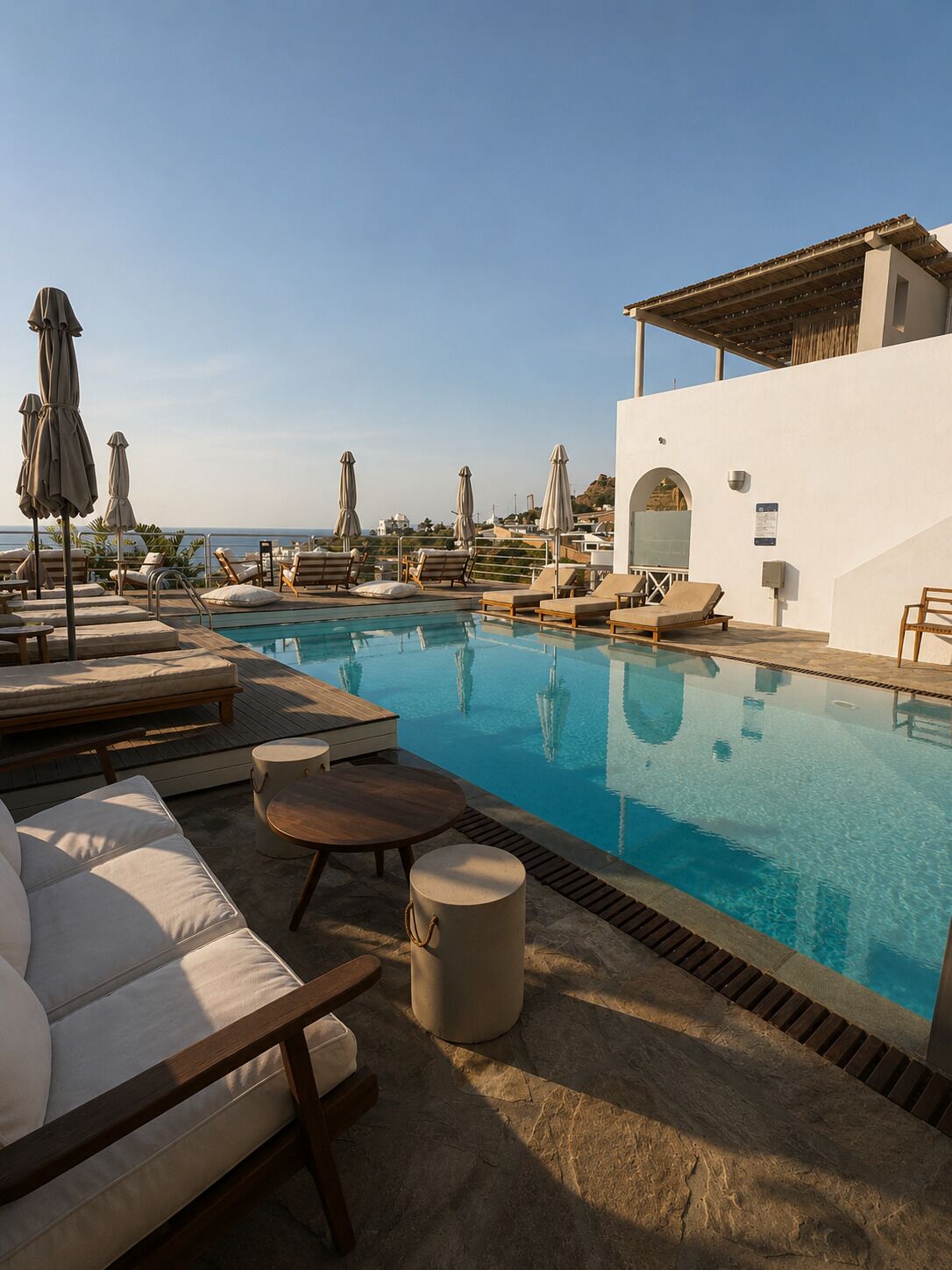 Outdoor pool, pool umbrellas, sun loungers