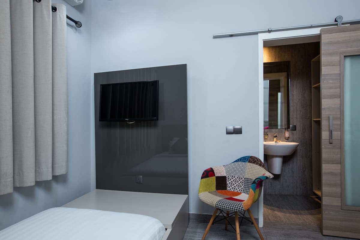 Eenpersoonskamer | 1 slaapkamer, een minibar, een kluis op de kamer, babybedden