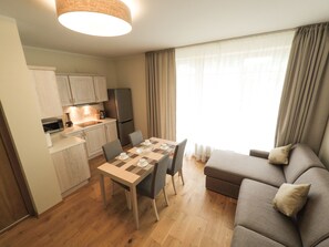 Luxury Apartment, 1 Bedroom, Balcony | Living room | 32-inch flat-screen TV with digital channels, TV