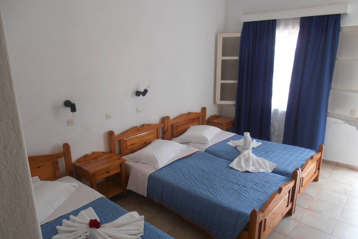 Standard Triple Room, Garden View | Cribs (free), WiFi (free)
