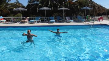 Outdoor pool, pool umbrellas, sun loungers