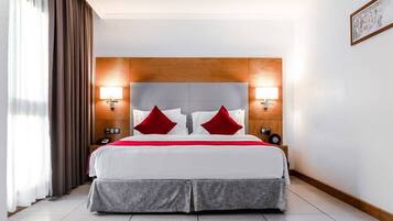 Departamento ejecutivo, 1 habitación, vista a la ciudad | Ropa de cama de alta calidad, edredón, camas Select Comfort y minibar