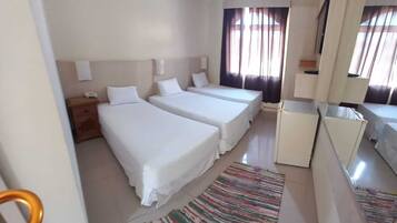 Triple Room | Minibar, in-room safe, free WiFi, bed sheets