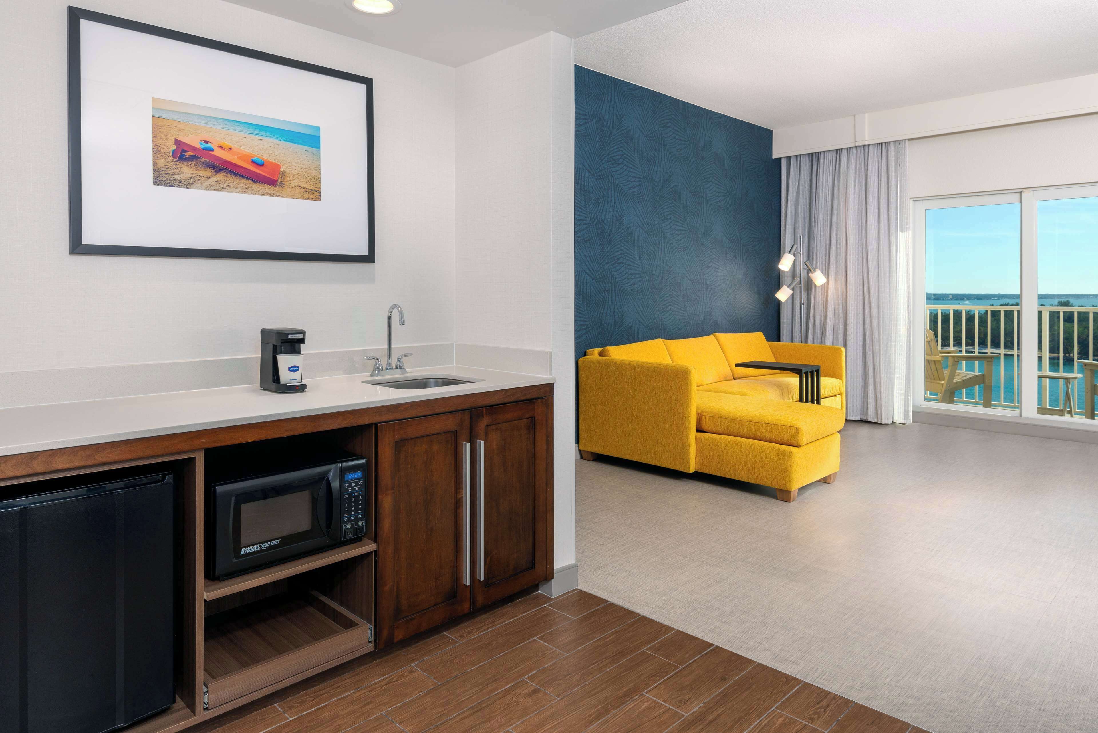 studio, 1 king bed, refrigerator & microwave, beach view | 1 bedroom, in-room safe, desk, laptop workspace