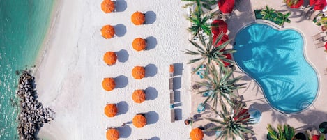 Outdoor pool, free pool cabanas, pool umbrellas