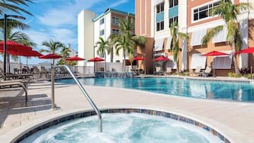 Outdoor pool, free pool cabanas, pool umbrellas